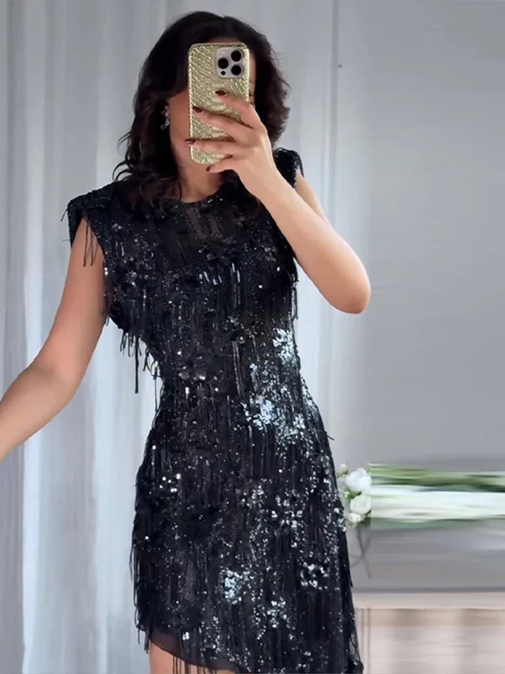 Dames mouwloze midi-jurk met pailletten en franjes met asymmetrische zoom