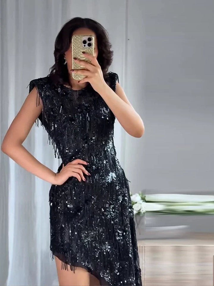 Dames mouwloze midi-jurk met pailletten en franjes met asymmetrische zoom