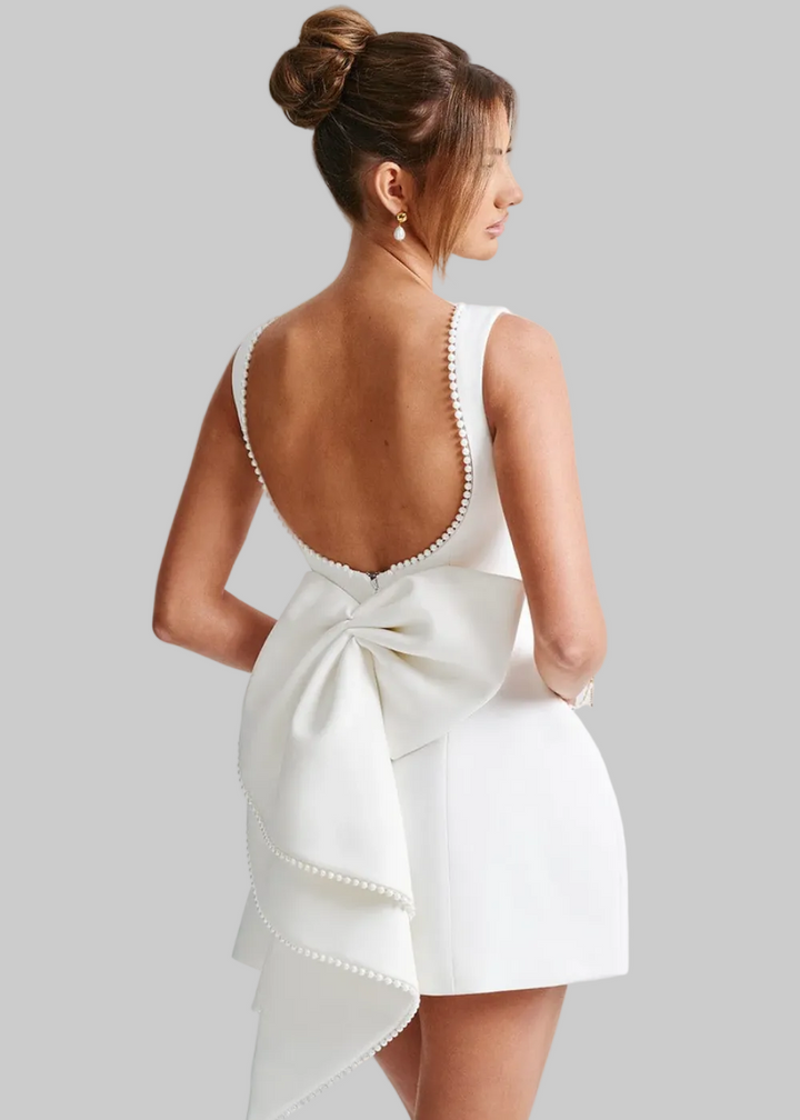 Dames mouwloze mini-jurk met parels en strik op de rug