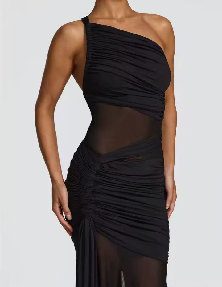 Dames maxi jurk met één schouder, geplooide top en transparante inzetstukken met uitlopende zoom