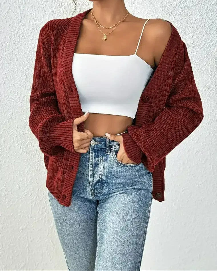 Dames Geribd vest met V-hals, knoopsluiting en pofmouwen