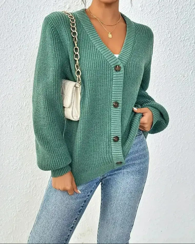 Dames Geribd vest met V-hals, knoopsluiting en pofmouwen