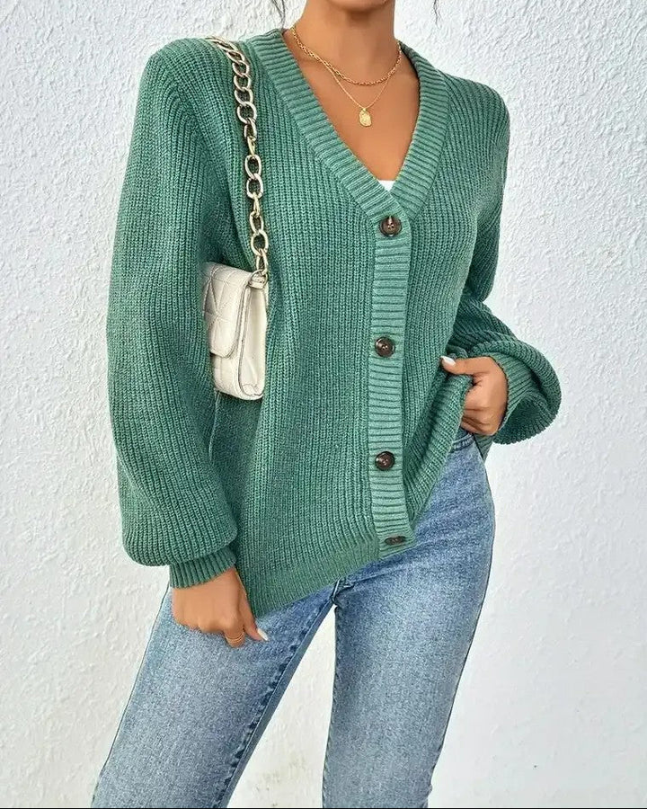 Dames Geribd vest met V-hals, knoopsluiting en pofmouwen