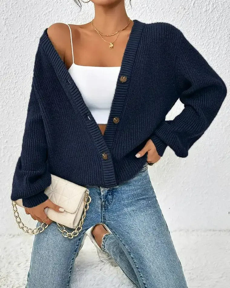 Dames Geribd vest met V-hals, knoopsluiting en pofmouwen