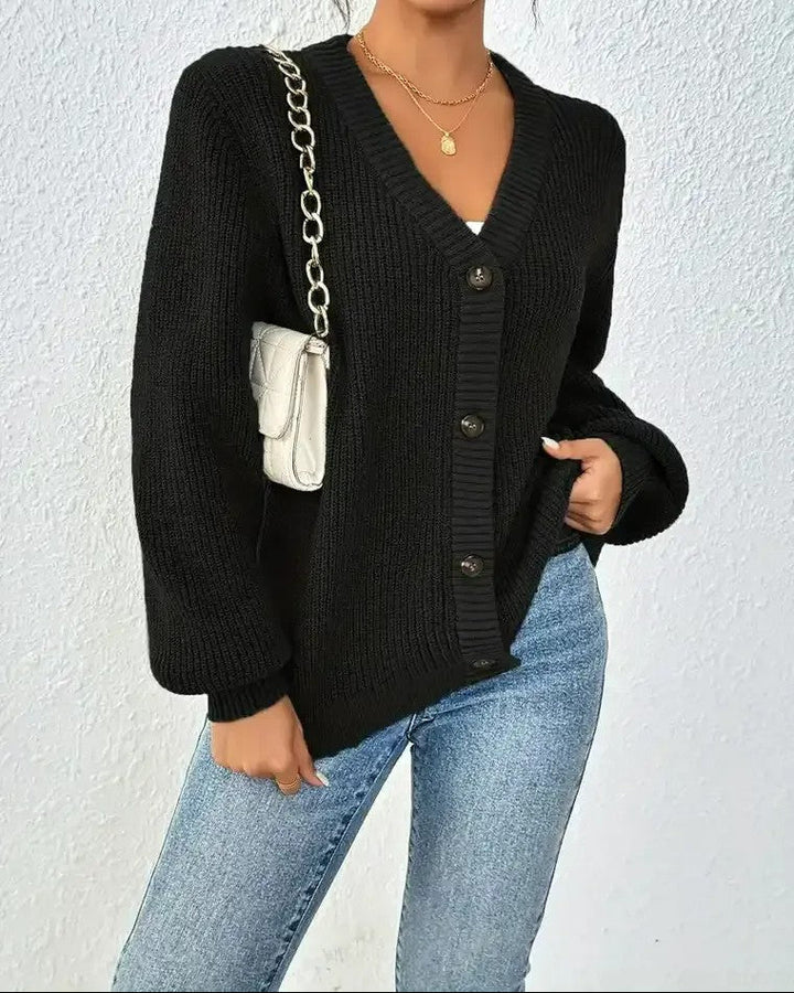 Dames Geribd vest met V-hals, knoopsluiting en pofmouwen