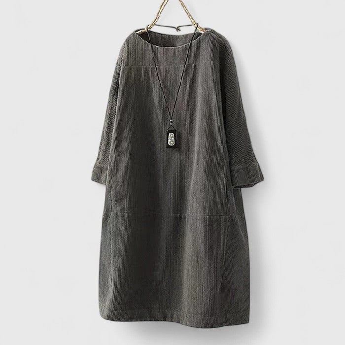 Dames geribde midi-jurk met ronde hals, driekwartmouwen en voorzakken