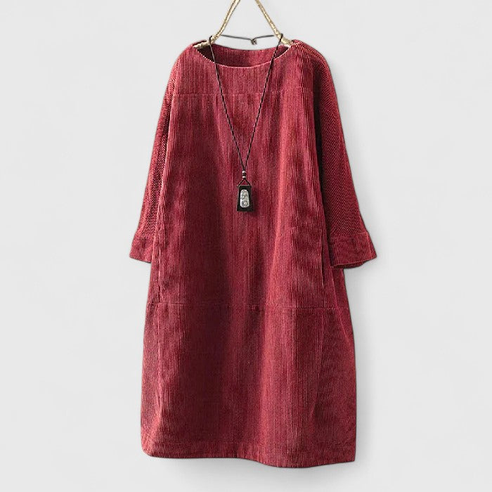 Dames geribde midi-jurk met ronde hals, driekwartmouwen en voorzakken