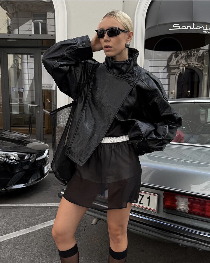 Damesjas met leren look en opstaande kraag