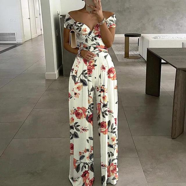 Damesjumpsuit met off-shoulderhals en wikkeltop met wijde pijpen