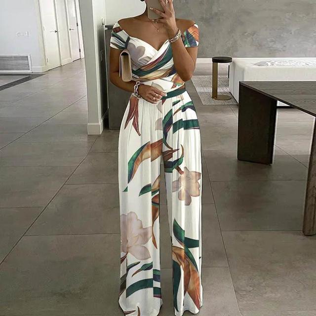 Damesjumpsuit met off-shoulderhals en wikkeltop met wijde pijpen