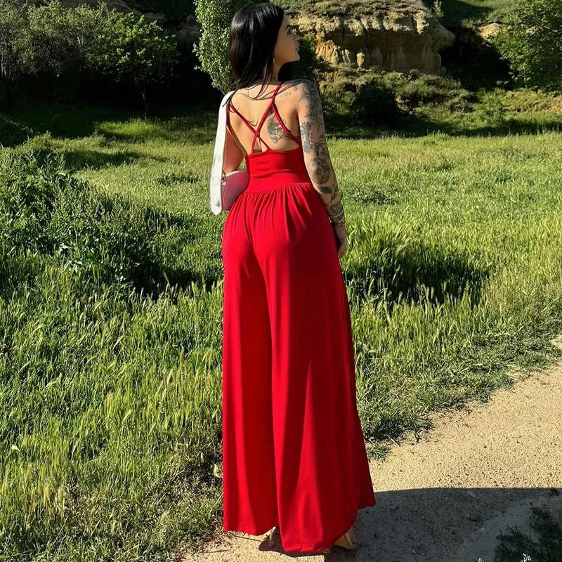 Dames jumpsuit met spaghettibandjes, V-hals, gekruiste rug en wijde pijpen