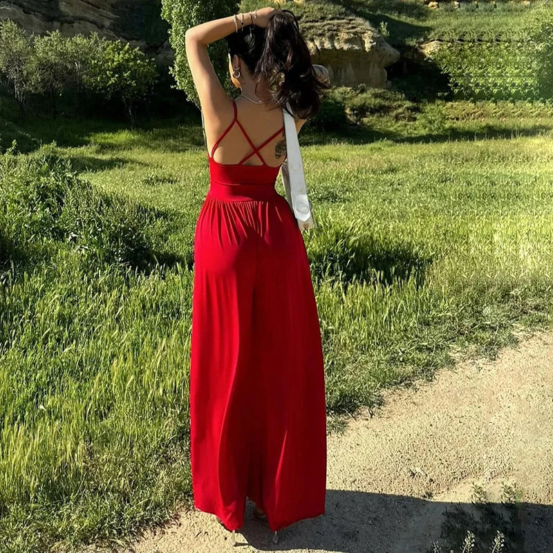 Dames jumpsuit met spaghettibandjes, V-hals, gekruiste rug en wijde pijpen