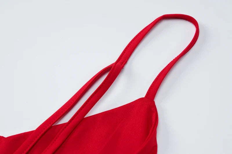 Dames jumpsuit met spaghettibandjes, V-hals, gekruiste rug en wijde pijpen