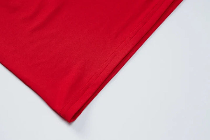 Dames jumpsuit met spaghettibandjes, V-hals, gekruiste rug en wijde pijpen