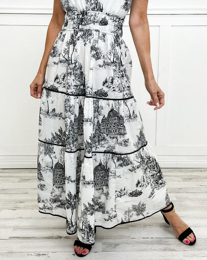 Dames maxi-jurk met korte mouwen, inkeping in de hals, geplooide taille, gelaagde rok en print