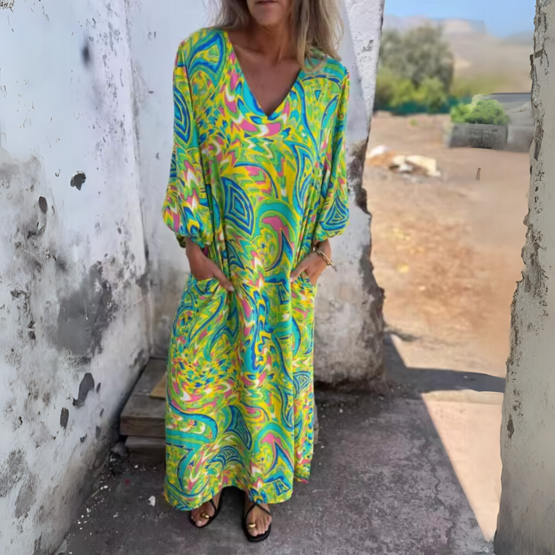 Dames maxijurk met lange mouwen, V-hals en patroon