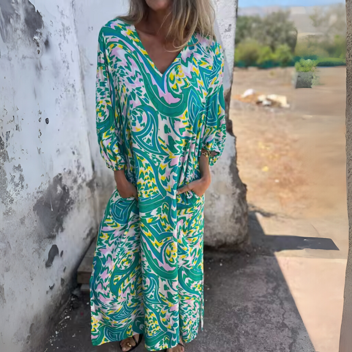 Dames maxijurk met lange mouwen, V-hals en patroon