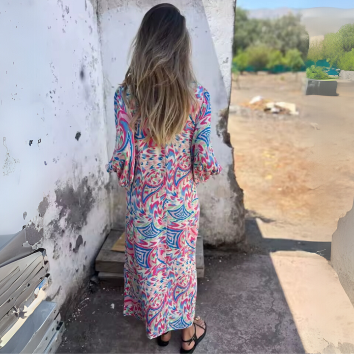 Dames maxijurk met lange mouwen, V-hals en patroon