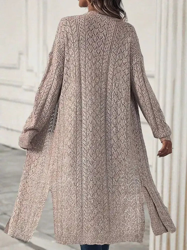 Dames lang open vest met zijsplitten en opengewerkt breipatroon