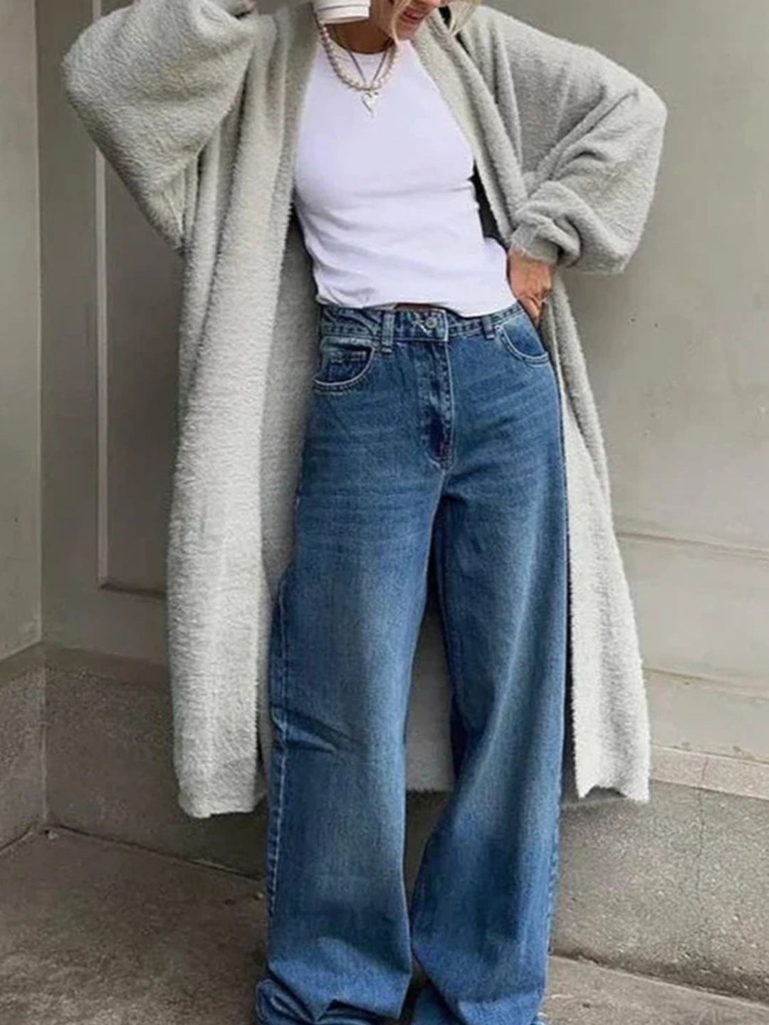 Dames lang vest met open voorkant en pluizige afwerking
