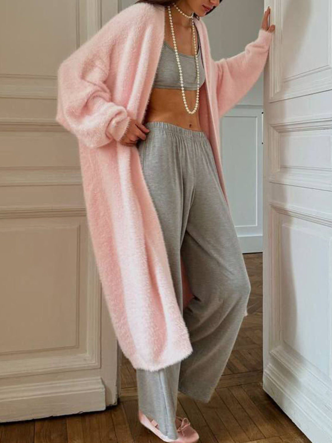 Dames lang vest met open voorkant en pluizige afwerking