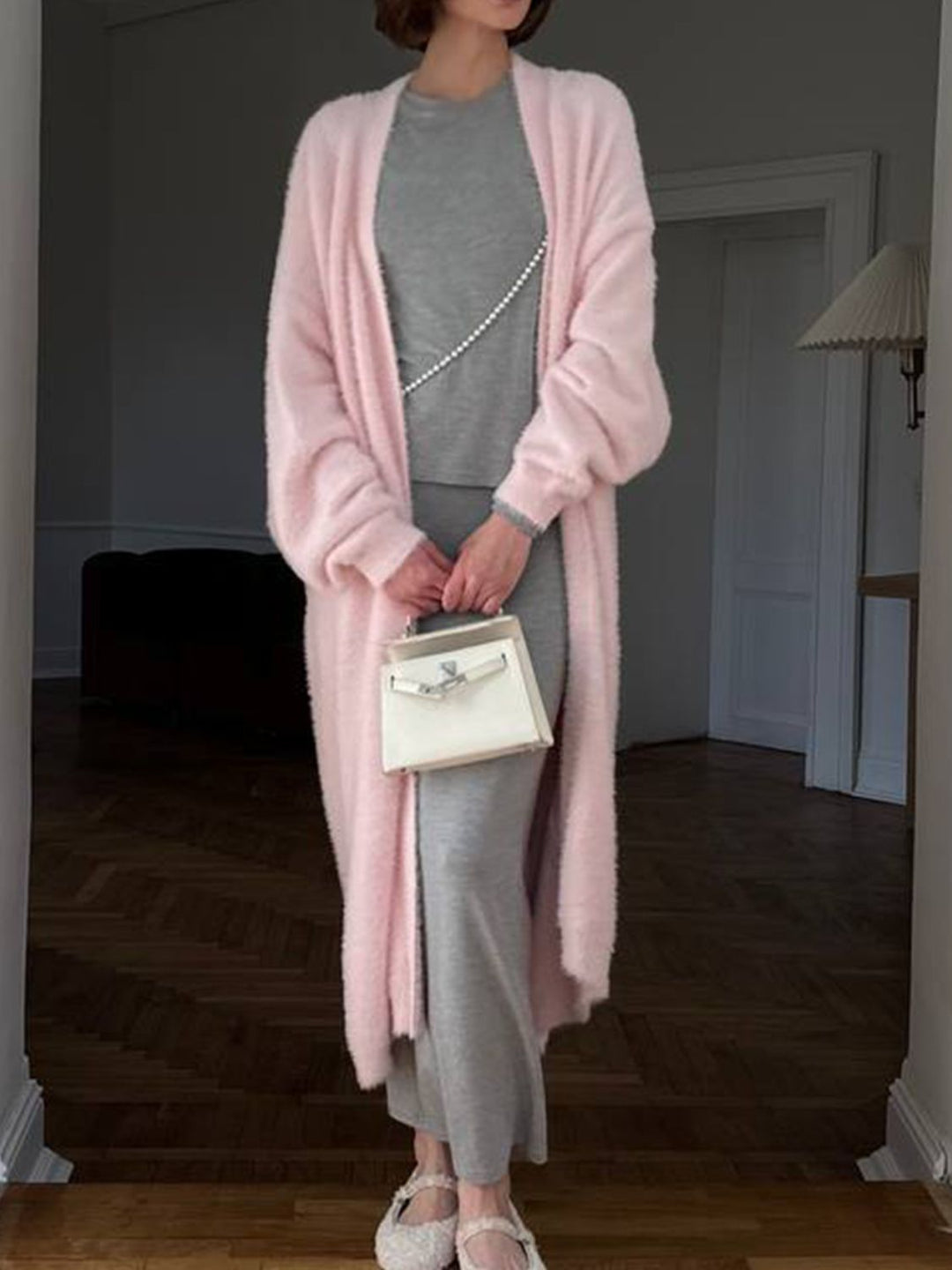 Dames lang vest met open voorkant en pluizige afwerking