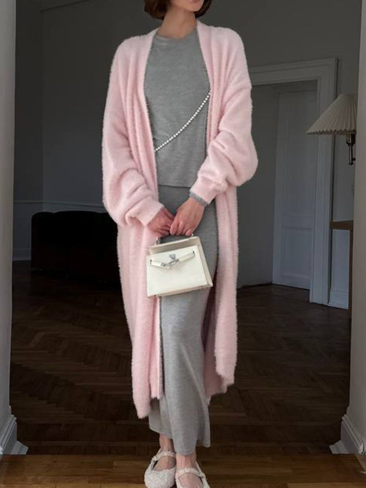 Dames lang vest met open voorkant en pluizige afwerking