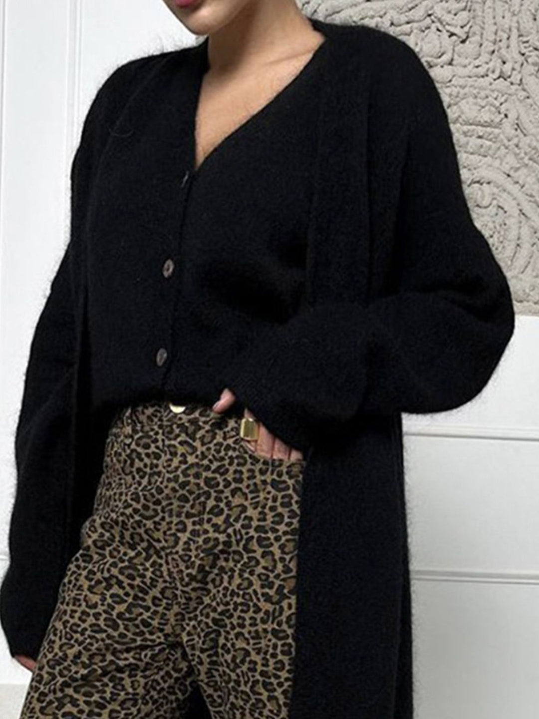 Dames lang vest met open voorkant en pluizige afwerking