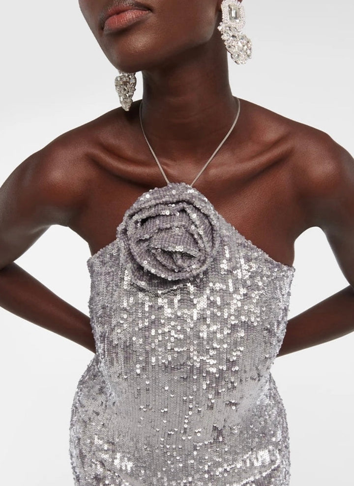 Dames maxi-jurk met halterhals, rozetapplicatie en paillettenversiering
