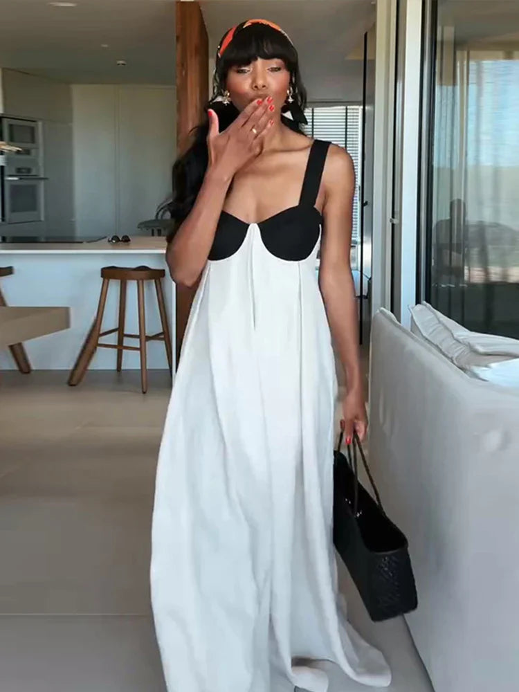 Dames maxijurk met bustiertop en brede bandjes