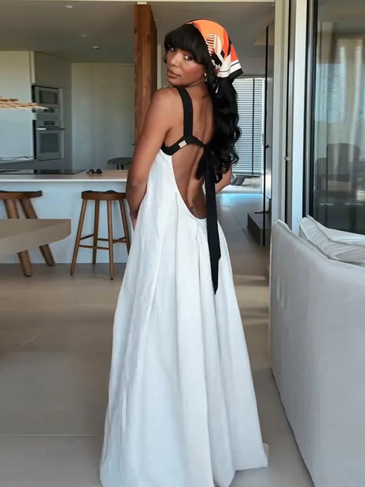 Dames maxijurk met bustiertop en brede bandjes