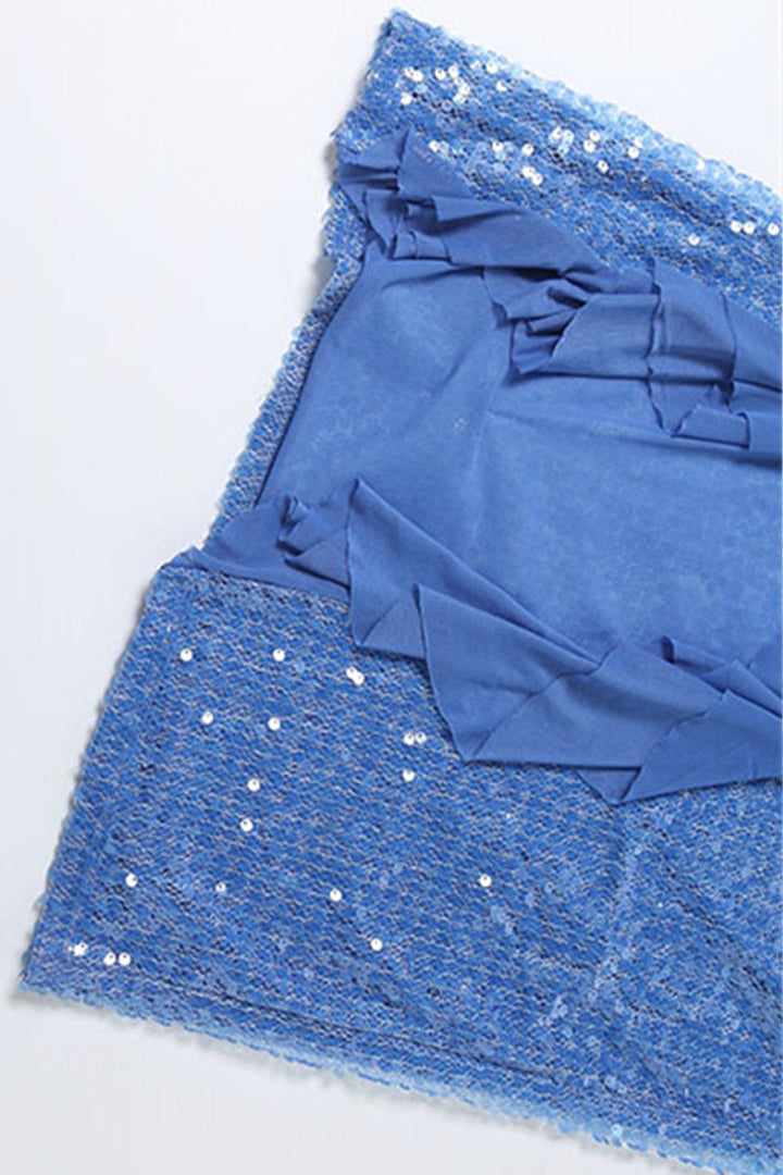 Dames maxi-jurk met pailletten, gekruiste halterbandjes en asymmetrische rucheszoom