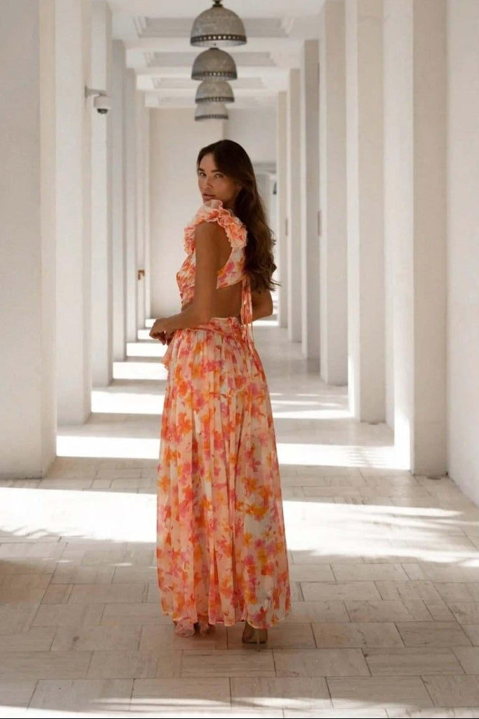 Dames maxi-jurk met diepe V-hals en ruchesmouwen met zijdelingse cut-outs en bloemenprint