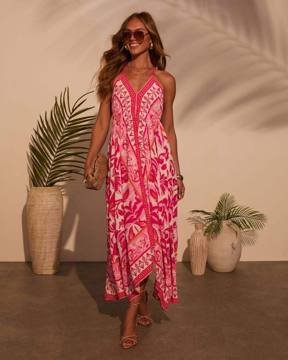 Maxi-jurk voor dames met V-hals en spaghettibandjes, open rug en asymmetrische zoom