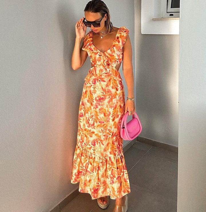 Dames maxi-jurk met V-hals en volantbandjes met zijdelingse cut-outs en bloemenpatroon