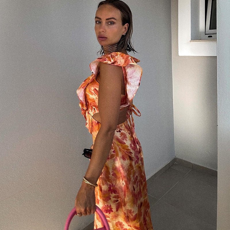 Dames maxi-jurk met V-hals en volantbandjes met zijdelingse cut-outs en bloemenpatroon