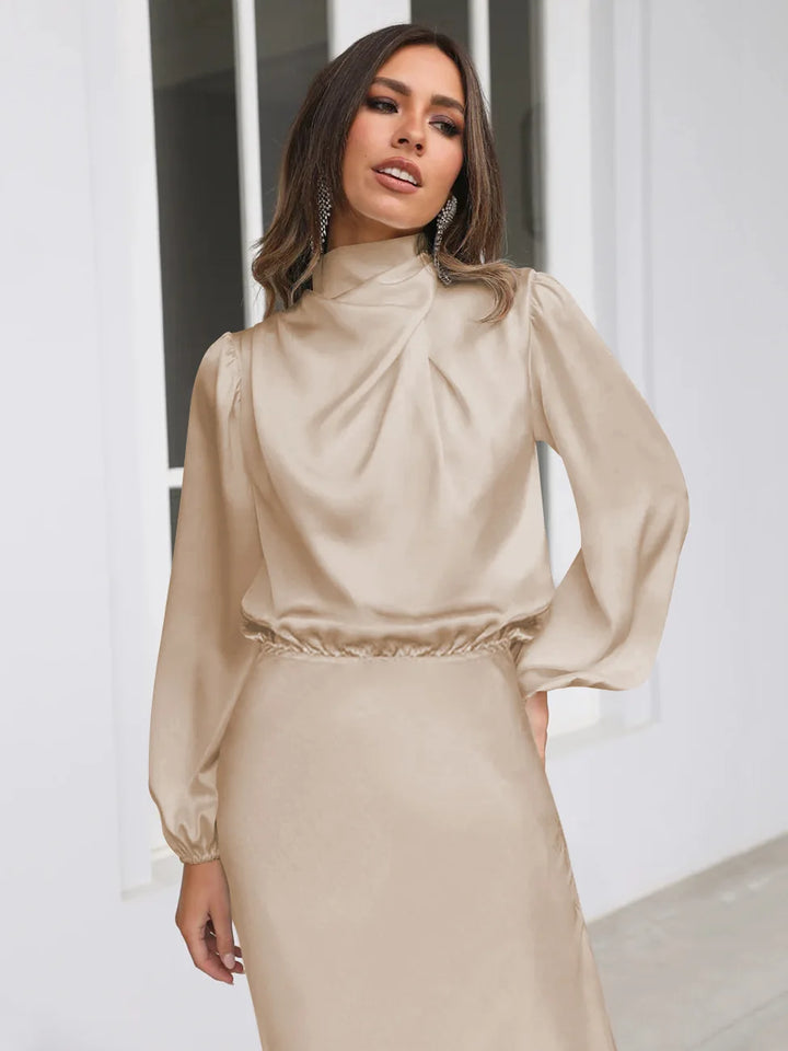 Dames midi-jurk met col en ballonmouwen met elastische tailleband