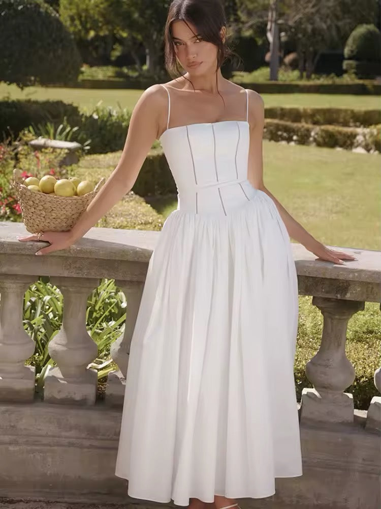 Dames midi-jurk met spaghettibandjes en korsetnaden op het bovenstuk