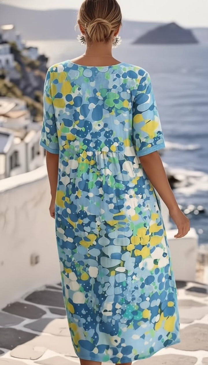 Damen Midikleid mit abstraktem Blumenmuster und rundem Halsausschnitt mit kurzen Ärmeln und Seitentaschen