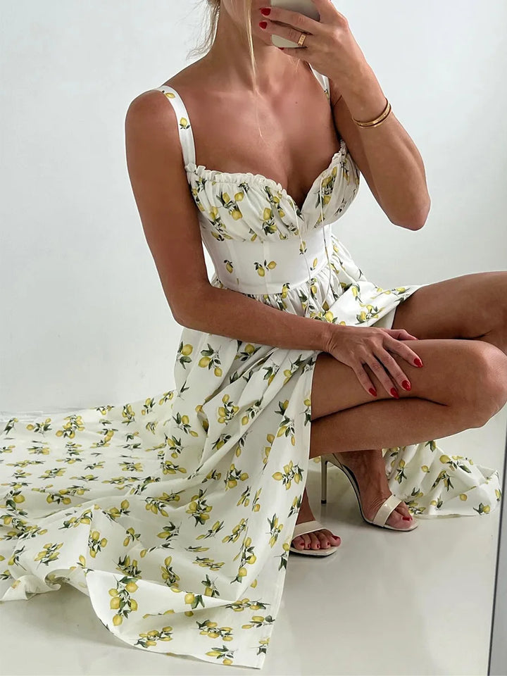 Dames midi-jurk met patroon en hartvormige halslijn met zijsplit en bandjes