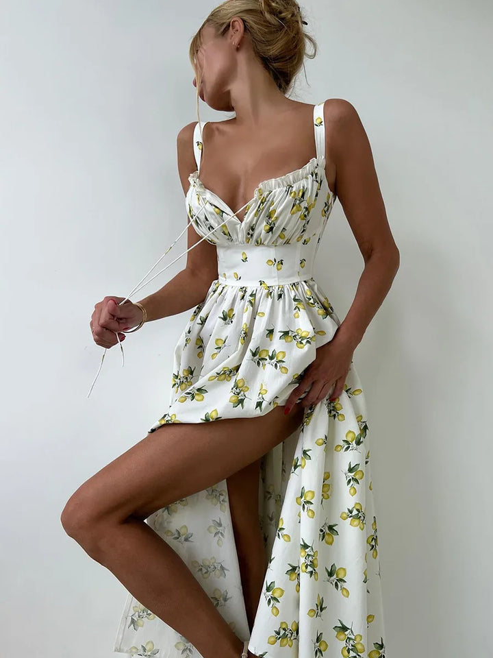 Dames midi-jurk met patroon en hartvormige halslijn met zijsplit en bandjes