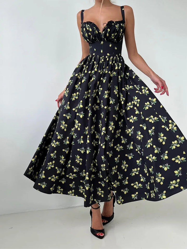 Dames midi-jurk met patroon en hartvormige halslijn met zijsplit en bandjes