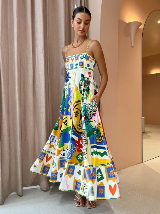 Dames midijurk met spaghettibandjes en vierkante halslijn met abstract kleurrijk patroon en A-lijn rok