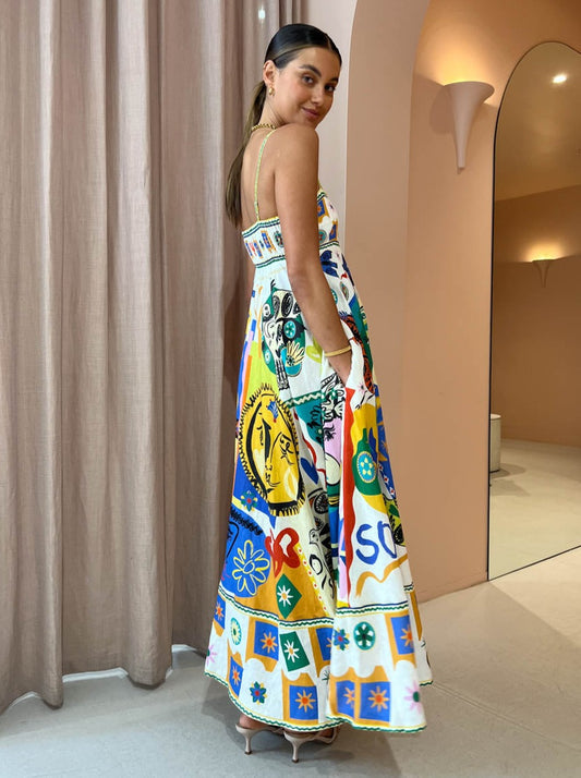 Dames midijurk met spaghettibandjes en vierkante halslijn met abstract kleurrijk patroon en A-lijn rok