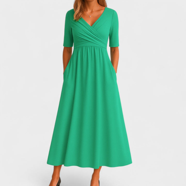 Damen Midikleid mit V-Ausschnitt im Wickelstil und kurzen Ärmeln mit Seitentaschen