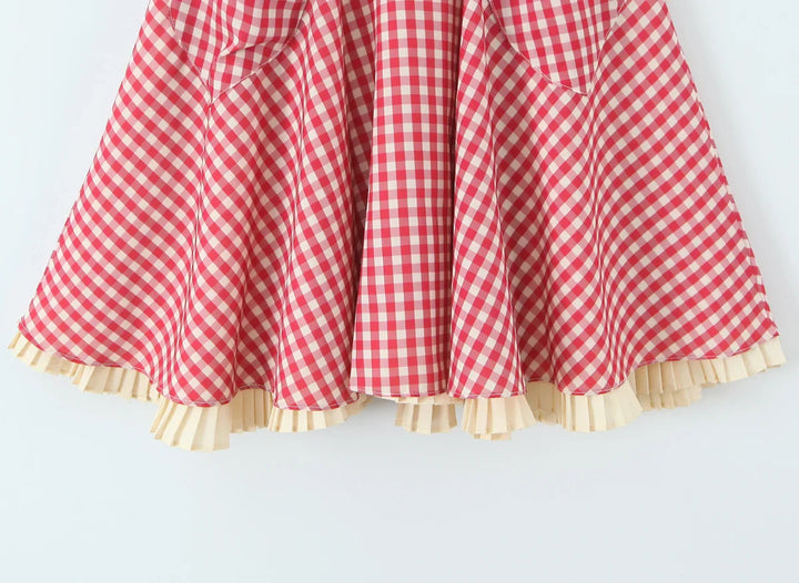 Dames minijurk met hartvormige halslijn, halterbandjes, knoopsluiting en ruitpatroon