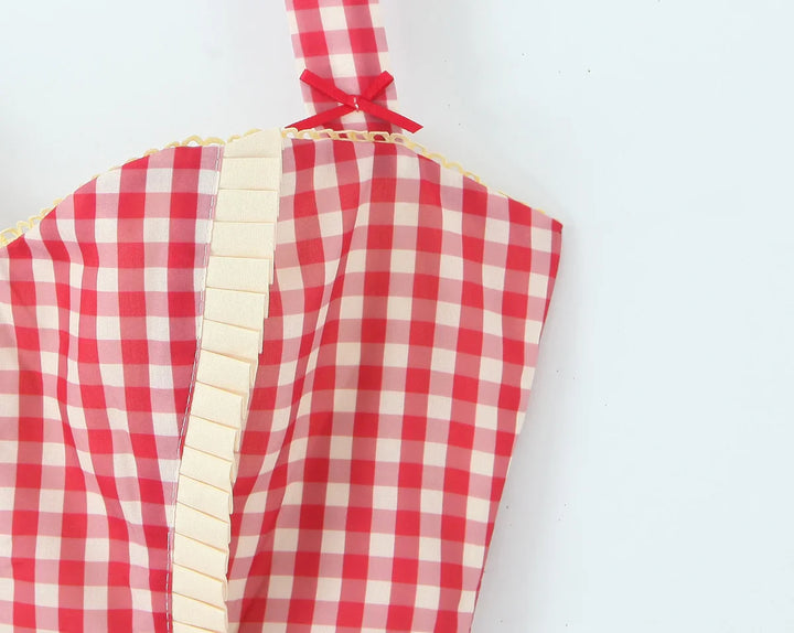 Dames minijurk met hartvormige halslijn, halterbandjes, knoopsluiting en ruitpatroon