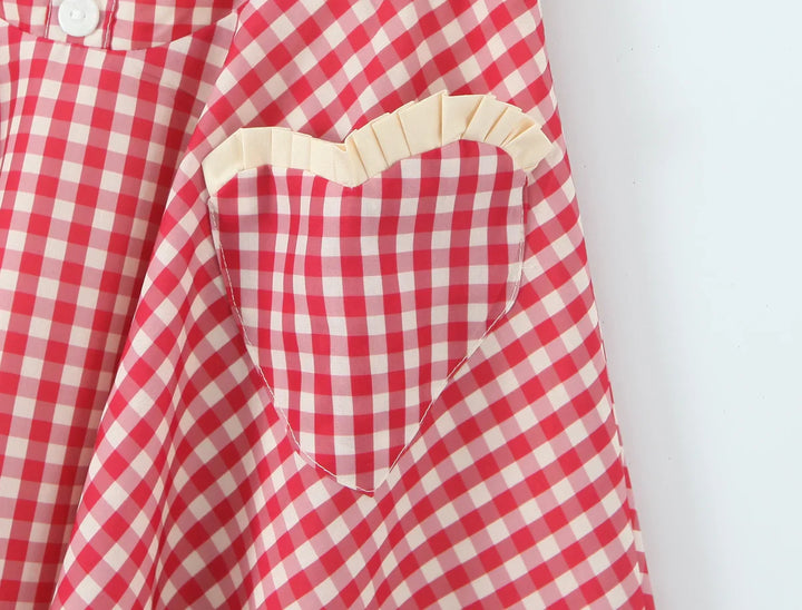 Dames minijurk met hartvormige halslijn, halterbandjes, knoopsluiting en ruitpatroon