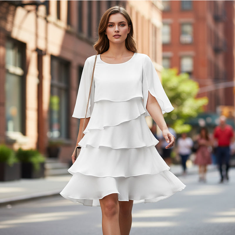 Damen Minikleid mit Rundhalsausschnitt und Puffärmeln mit mehrlagigem Rüschenrock