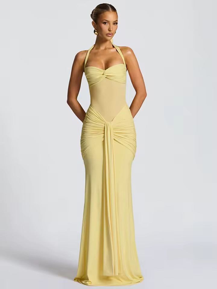 Dames maxi-jurk met halternek, semi-transparant inzetstuk en knoopdetail